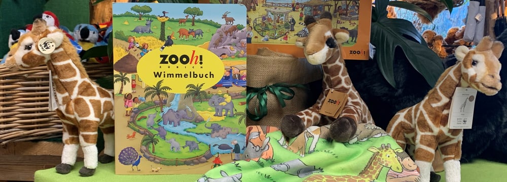 Promotionstisch mit Wimmelbildprodukten im Zooshop.